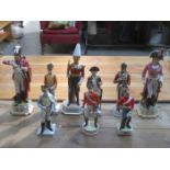 THREE LARGE HANDPAINTED AND GLAZED MILITARY FIGURES PLUS SIX SMALLER SIMILAR FIGURES