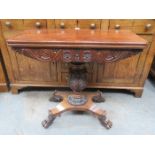 HEAVILY CARVED ANTIQUE WALNUT FOLD OVER GAMES TABLE ON QUADRAFOIL CLAW SUPPORTS