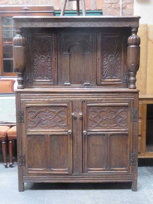 19th CENTURY CARVED FRONTED COURT CUPBOARD