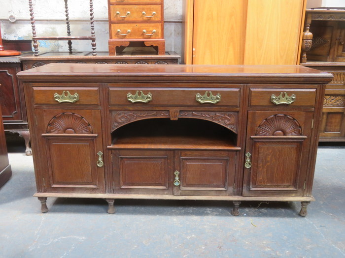 CARVED FRONTED OAK SIDEBOARD