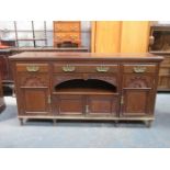 CARVED FRONTED OAK SIDEBOARD