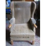 OAK FRAMED AND UPHOLSTERED PARKER KNOLL ARMCHAIR (FOR RESTORATION)