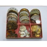 BOX CONTAINING DIALS AND MOVEMENTS FOR SPARES AND REPAIRS,