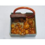 PARCEL OF LOOSE AMBER BEADS, BANGLE AND EARRINGS, ETC.