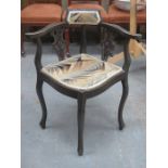 EBONISED AND UPHOLSTERED CORNER CHAIR
