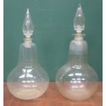 TWO SIMILAR ANTIQUE BELL FORM PHARMACIST'S CARBOY GLASS STORAGE DECANTERS WITH STOPPERS