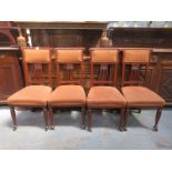 SET OF FOUR CARVED AND PIERCEWORK DECORATED UPHOLSTERED CHAIRS