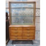 MID 20th CENTURY CHEST OF EIGHT DRAWERS WITH GLAZED BOOKCASE TOP SECTION