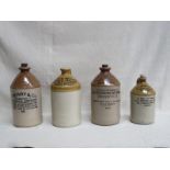 FOUR VARIOUS STONEWARE ADVERTISING FLAGONS