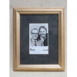 MORECAMBE AND WISE SIGNED BBC PRESS CARD,