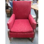 UPHOLSTERED AND CARVED FRAMED ARMCHAIR