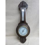 CARVED OAK CASED ANEROID BAROMETER