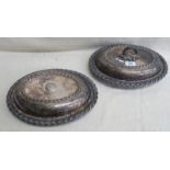 PAIR OF ORNATELY DECORATED SILVER PLATED ENTREE DISHES WITH COVERS,