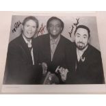 Cliff Richard, Lamont Dozier & David Gest black & white photograph by Nicky Johnston signed by all