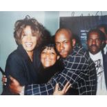 Colour photograph of Whitney Houston & Bobby Brown signed ?Love Always Whitney Houston-Bobby