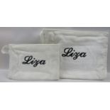 Two wash bags embroidered Liza formally property of Liza Minnelli