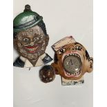 Two character wall clocks plus carved bust