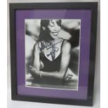 Whitney Houston signed black & white photograph framed and mounted 23cms x 18cms