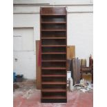 Set of four 20th century bespoke highly polished and veneered storage shelves, possibly for CD's