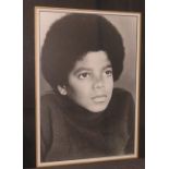 Early Michael Jackson black and white photograph signed framed and mounted. 35cms x 26cms