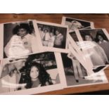 A collection of 12 black and white photographs of Michael Jackson and various Jackson family members