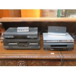 Parcel of electrical equipment in VHS player, three DVD players, BOSE transmitters, cassette deck,