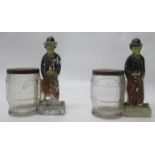 Two Charlie Chaplin painted glass containers/money boxes 1920?s