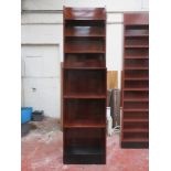 Set of four 20th century bespoke highly polished and veneered storage shelves, possibly for CD's and