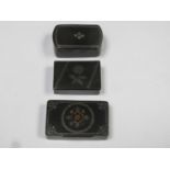 Three various hinged victorian ebonised snuff boxes, all with silver coloured metal inlay to lids