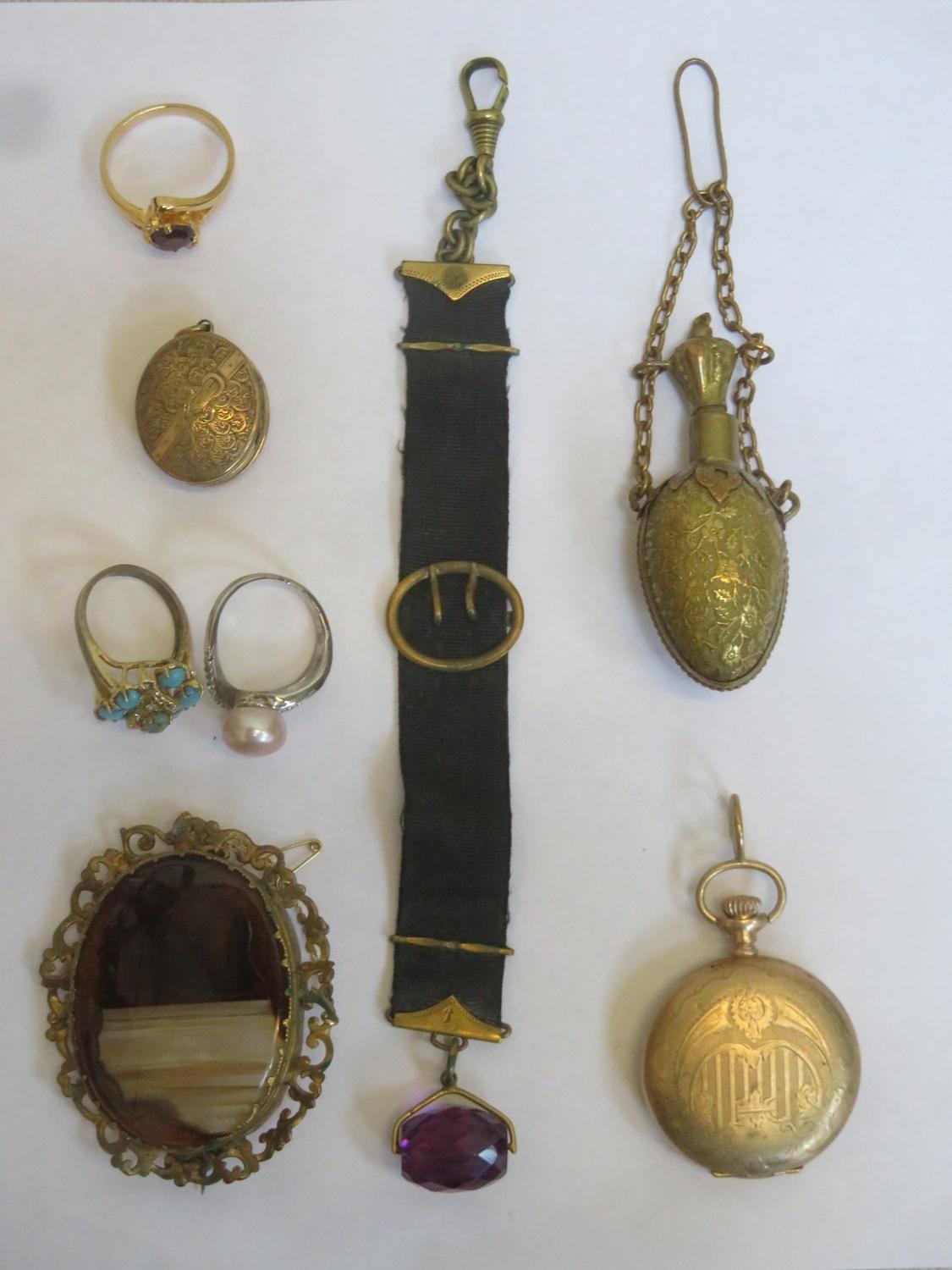 Parcel of gold coloured jewellery including Elgin fob watch, Victorian oval brooch, oval locket,