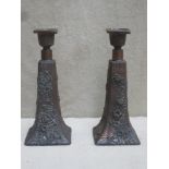 Pair of 19th century Oriental relief floral decorated copper candlesticks. Approx. 23cms high