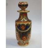 19th century glazed pottery perfume decanter, hand painted and gilded throughout with floral swags