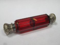 Victorian ruby red facet cut glass double ended scent / perfume bottle, with ornately repousse