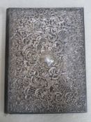 Victorian leather bound and ornately silver mounted desk blotter, decorated with acanthus leaves and