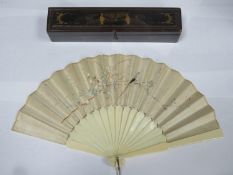 Vintage embroidered silk and ivory hand fan, within a gilded decorative oriental fan box