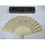 Vintage embroidered silk and ivory hand fan, within a gilded decorative oriental fan box