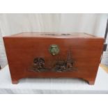20th century Japanese camphor chest, with carved pagoda scene to front & top