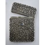 Early 20th century Indian silver hinged calling card case, ornately decorated with scrolled