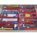 Parcel of 10 boxed Corgi heavy haulage long wheel base articulated vehicles, various liveries