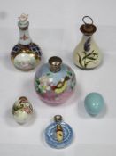 Parcel of seven ceramic perfume bottles, various sizes and designs inc. silver topped and hand