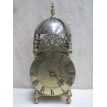 17th / 18th century brass lantern clock on raised supports and with double chain driven fusee