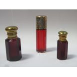 Victorian ruby glass cylindrical scent / perfume bottle, with hallmarked silver gilt screw cap,