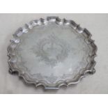 Hallmarked silver wave edged salver on raised supports, engraved with floral swags & 3rd Battalion