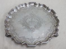 Hallmarked silver wave edged salver on raised supports, engraved with floral swags & 3rd Battalion