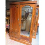 Edwardian mahogany inlaid two door wardrobe, fitted with two drawers to front