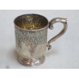 Mid Victorian hallmarked silver repousse decorated christening tankard by Thomas Bradbury & Sons (