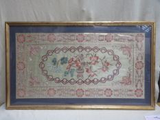 Large vintage framed silk panel, decorated with needlework depicting a vase of flowers, in the