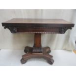 Victorian Rosewood fold over games table with carved decoration on Quadrofoil supports