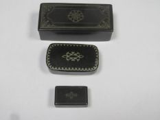 Three various hinged victorian snuff boxes, all with silver coloured metal inlay to lids