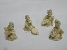 Four miniature heavily carved Oriental ivory seated Geisha figures